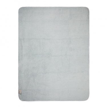 Logotrade meene foto: Vinga lambamustriga taaskasutatud materjalist pleed